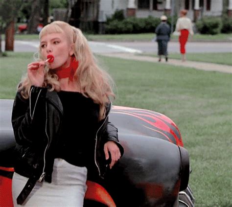 Traci Lords licks her anus